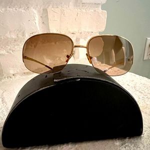 Prada sunglasses. Used great condition. No scratches.